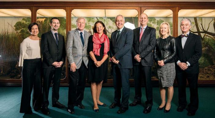 The executive management team stood in a group